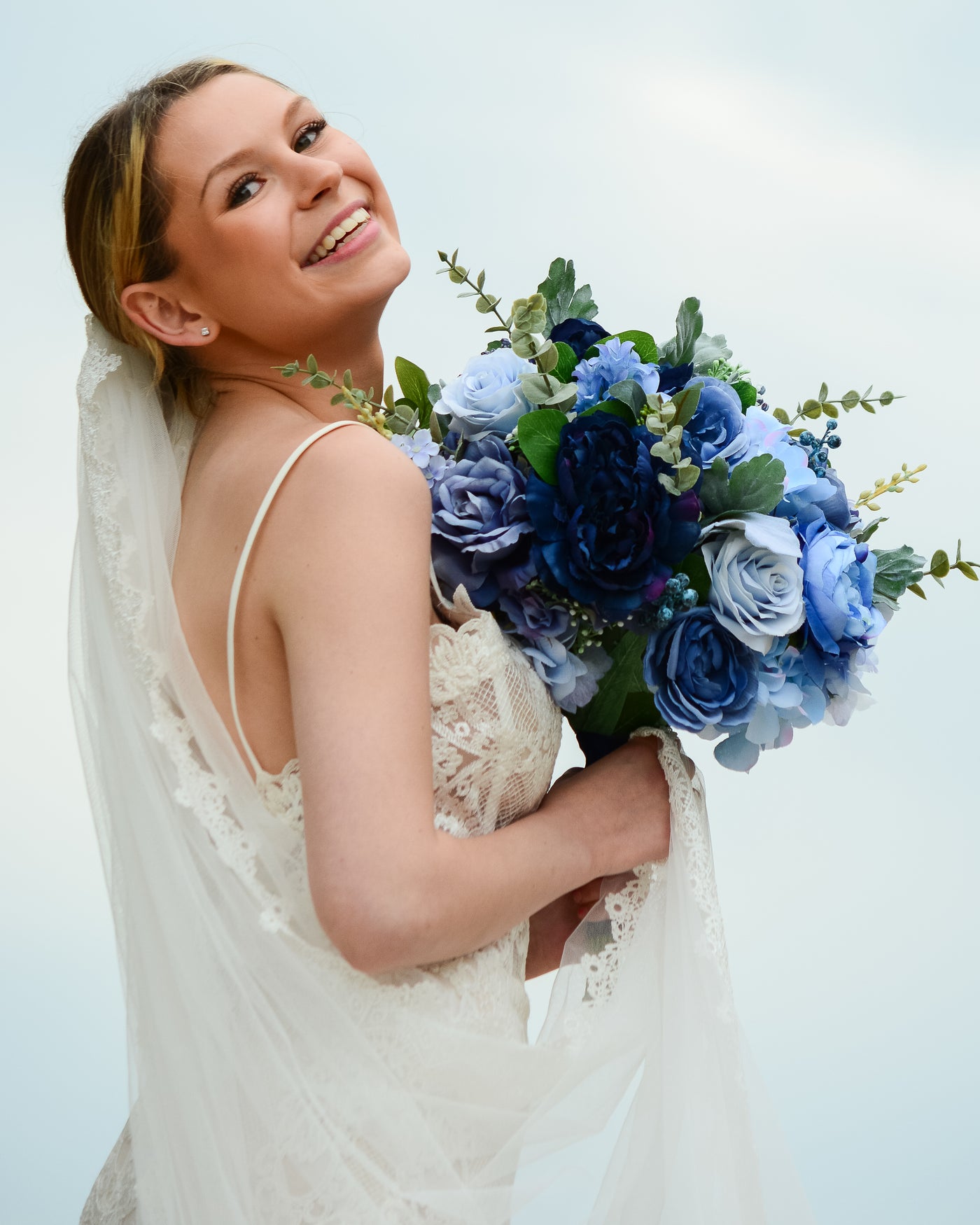Rent a Rose-Bridal Bouquet- Navy, white and pale blue roses with Eucalyptus. Rent for five days for $98.00