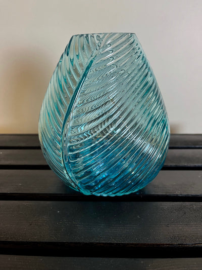 This glass teal accent light is 6 inches tall x 7 inches wide. For visual interest teal glass bead have been added inside so that when the fairy lights are illuminated they sparkle.