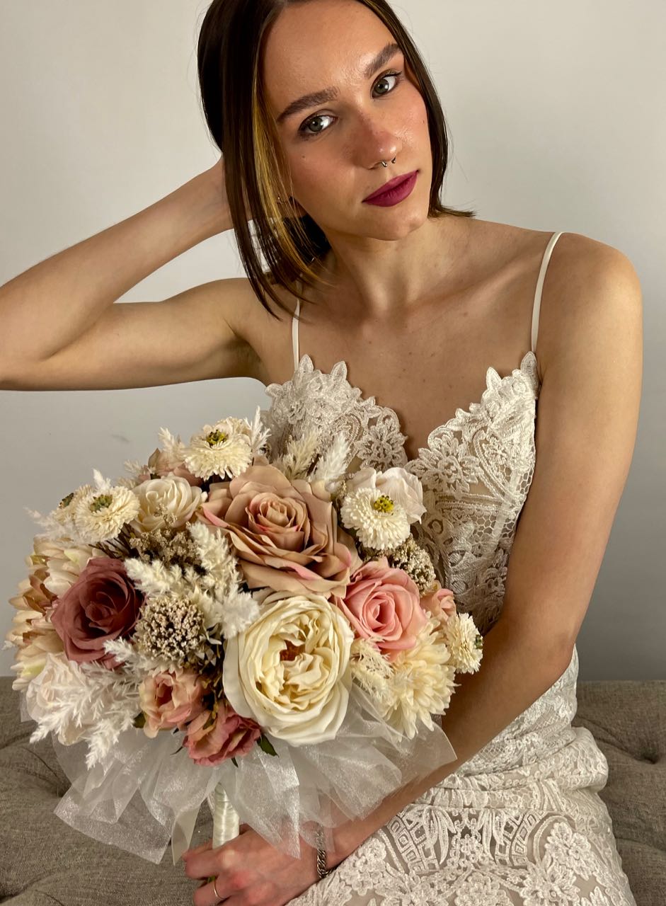 Rent A Rose Bridal Bouquet with blush pink, cream and cappuccino roses. $88.00 to rent for five days.