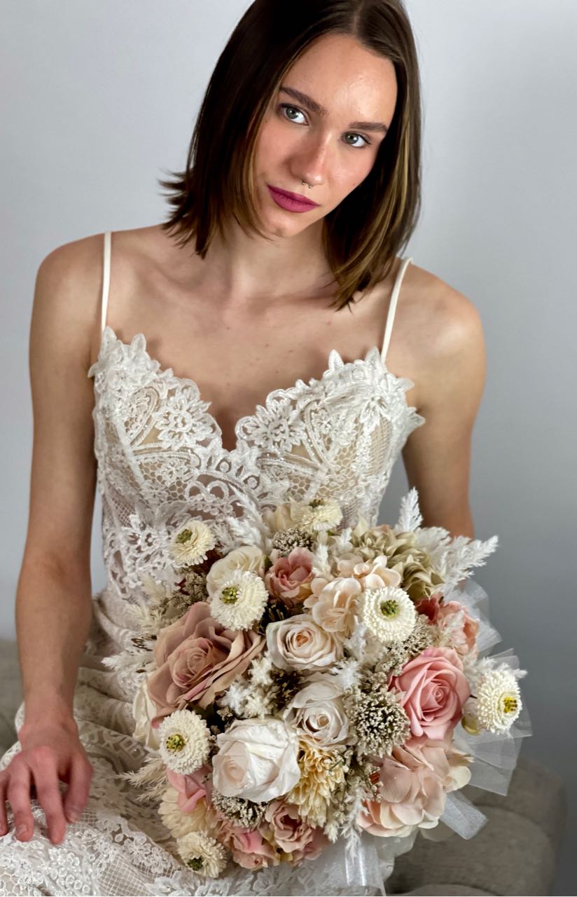 Rent A Rose Bridal Bouquet with blush pink, cream and cappuccino roses. $88.00 to rent for five days.