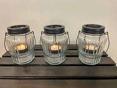 Rent a Rose- Wedding Decor-Mini Black and glass table lanterns. The price to rent a single votive including candle is $2.00
