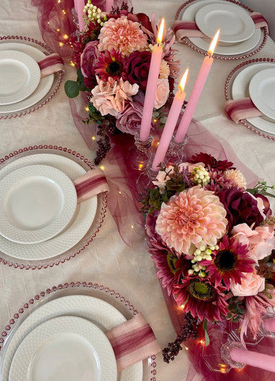 Rent a Rose- Centrepiece- Burgundy and pink flowers-  Rent for five days for $54.00.