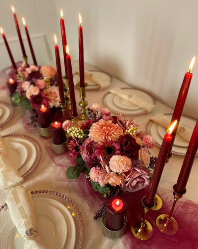 Rent a Rose- Centrepiece- Burgundy and pink flowers-  Rent for five days for $54.00.