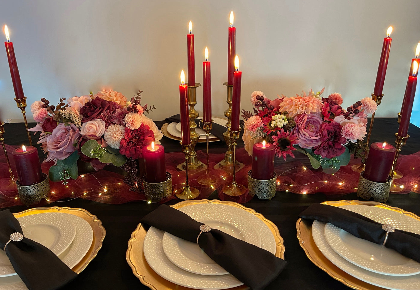 Rent a Rose- Centrepiece- Burgundy and pink flowers-  Rent for five days for $20.00.
