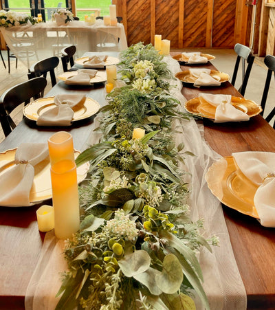 Rent a Rose- Eucalyptus Greenery for the center of a long rectangular table.