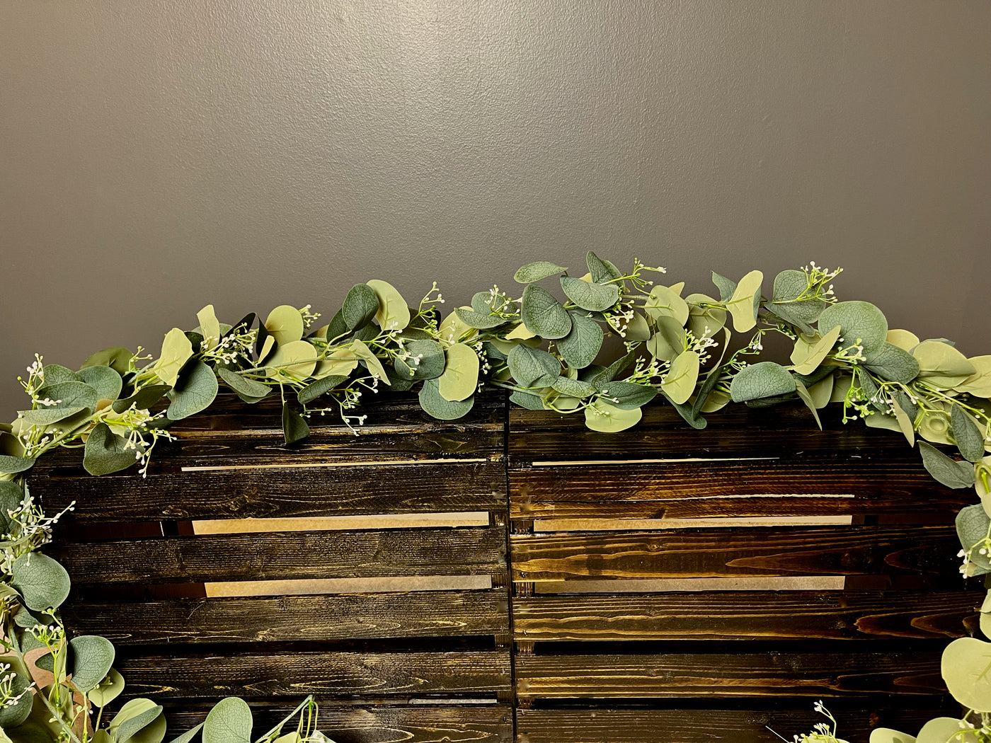 6 ft 3" eucalyptus garland with delicate babies breath detail. Attach several together for a longer garland to accommodate your decor needs! 
