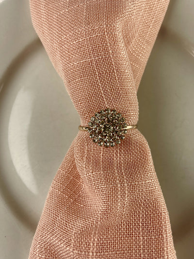 Delicate rose gold napkin ring holder.