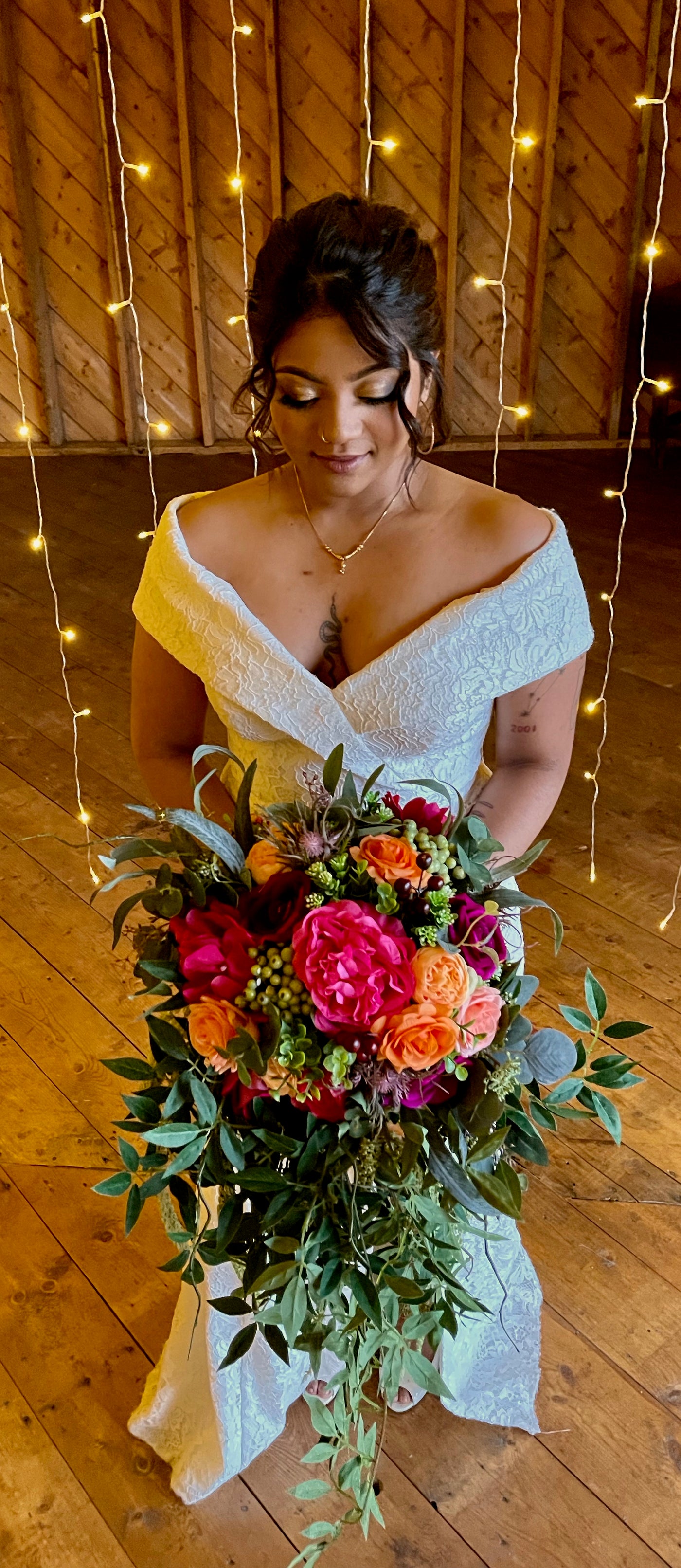 Cascading Bridal Bouquet in fuschia, magenta and apricot