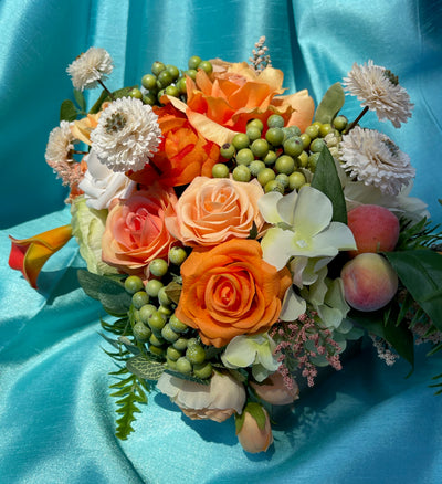 Rent a Rose- Centrepiece- orange, white and pale green flowers-  Rent for five days for $54.00.