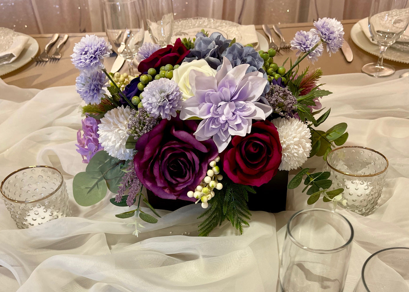 Rent a Rose- Centrepiece- Purple, Lavender, Fuchsia and white flowers-  Rent for five days for $54.00