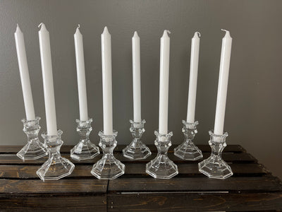 These eight glass candle holders stand 3 inches tall and 3.5 inches wide.  Candles are available in white, pink and burgundy and they are included in the rental cost of $12.00