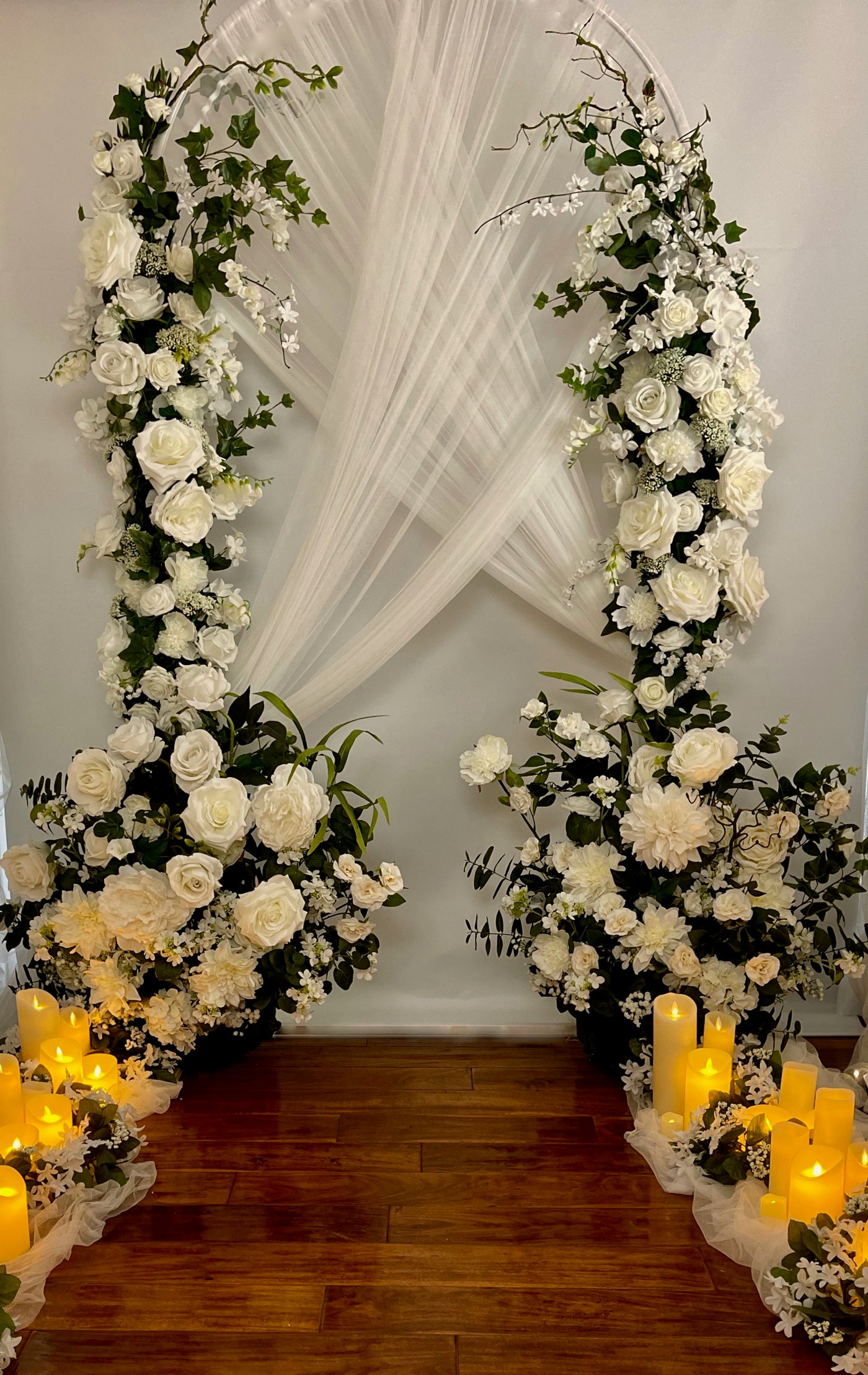 Create the perfect dreamy atmosphere for your wedding by incorporating these crisp white florals into your decor nuptials. There are five separate pieces to this wedding arch, and each piece can be rented separately. The total price to rent all five pieces is $525.00.