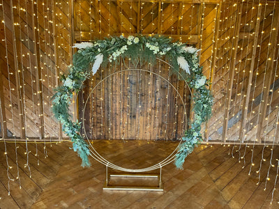 Rent A Rose- Seven pieces of greenery for a circular arch. Can also be placed on a table as a table runner.